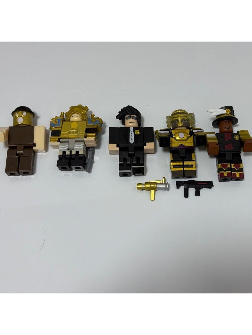 Roblox 3” Deluxe Action Figures Set of 4 with Gold, Black, and Brown Accents